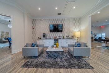 a view of a living room and a kitchen from above